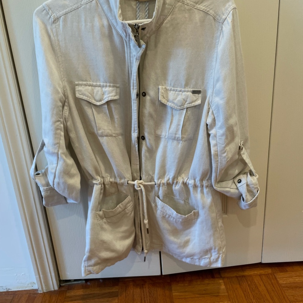 light taupe/cream colored summer linen jacket. Sleeves adjustable with snaps.